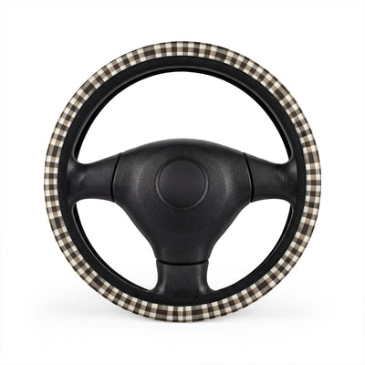 Black brown houndstooth steering wheel cover, on a steering wheel