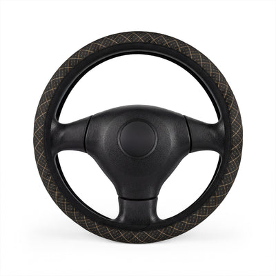 Black gold plaid steering wheel cover, on a steering wheel