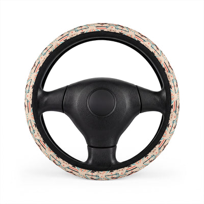 Cream pastel aztec steering wheel cover, on a steering wheel