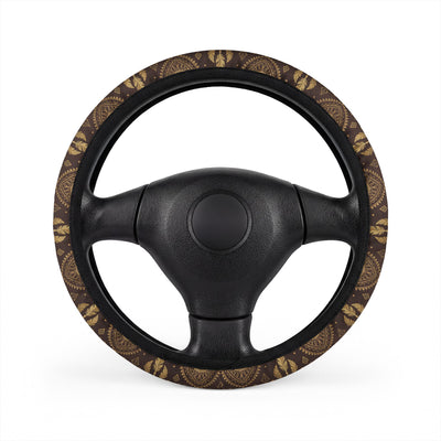 Dark brown desert boho steering wheel cover, on a steering wheel