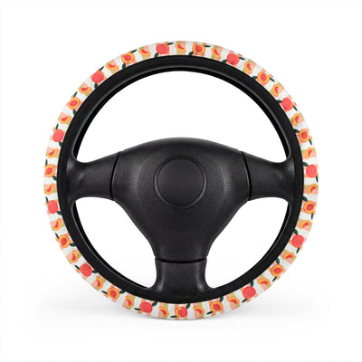 Peach fruit print steering wheel cover, on a steering wheel