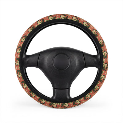 Pink camo steering wheel cover, on a steering wheel