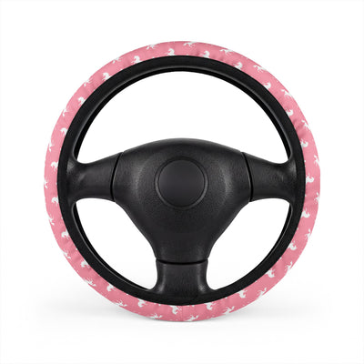 Pink unicorn steering wheel cover, on a steering wheel