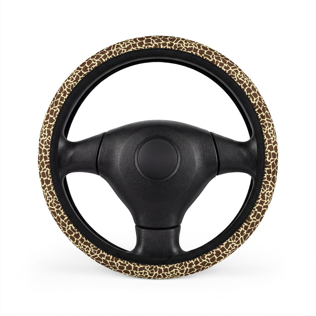 Beige brown giraffe print steering wheel cover, on a steering wheel