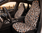 Beige brown leopard print car seat covers shown in a car interior