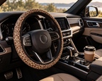 Beige brown leopard print steering wheel cover shown in a car interior