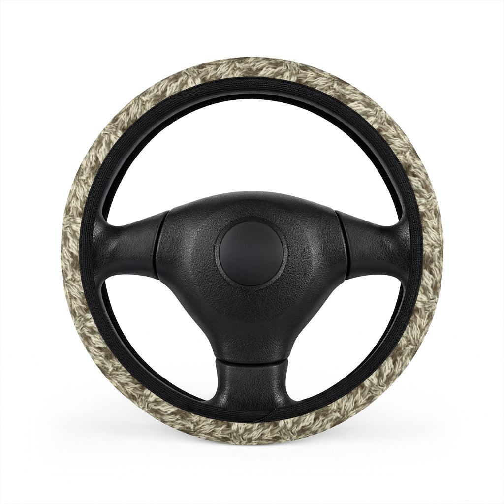 Beige fur look steering wheel cover, on a steering wheel