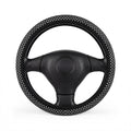 Black big polka dot steering wheel cover, on a steering wheel