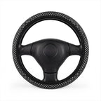 Black big polka dot steering wheel cover, on a steering wheel