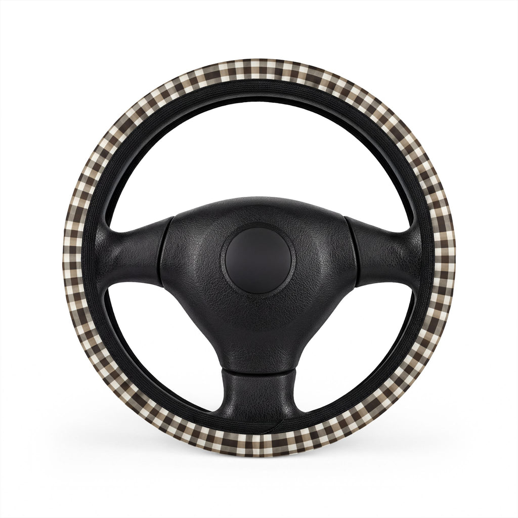 Black brown houndstooth steering wheel cover, on a steering wheel
