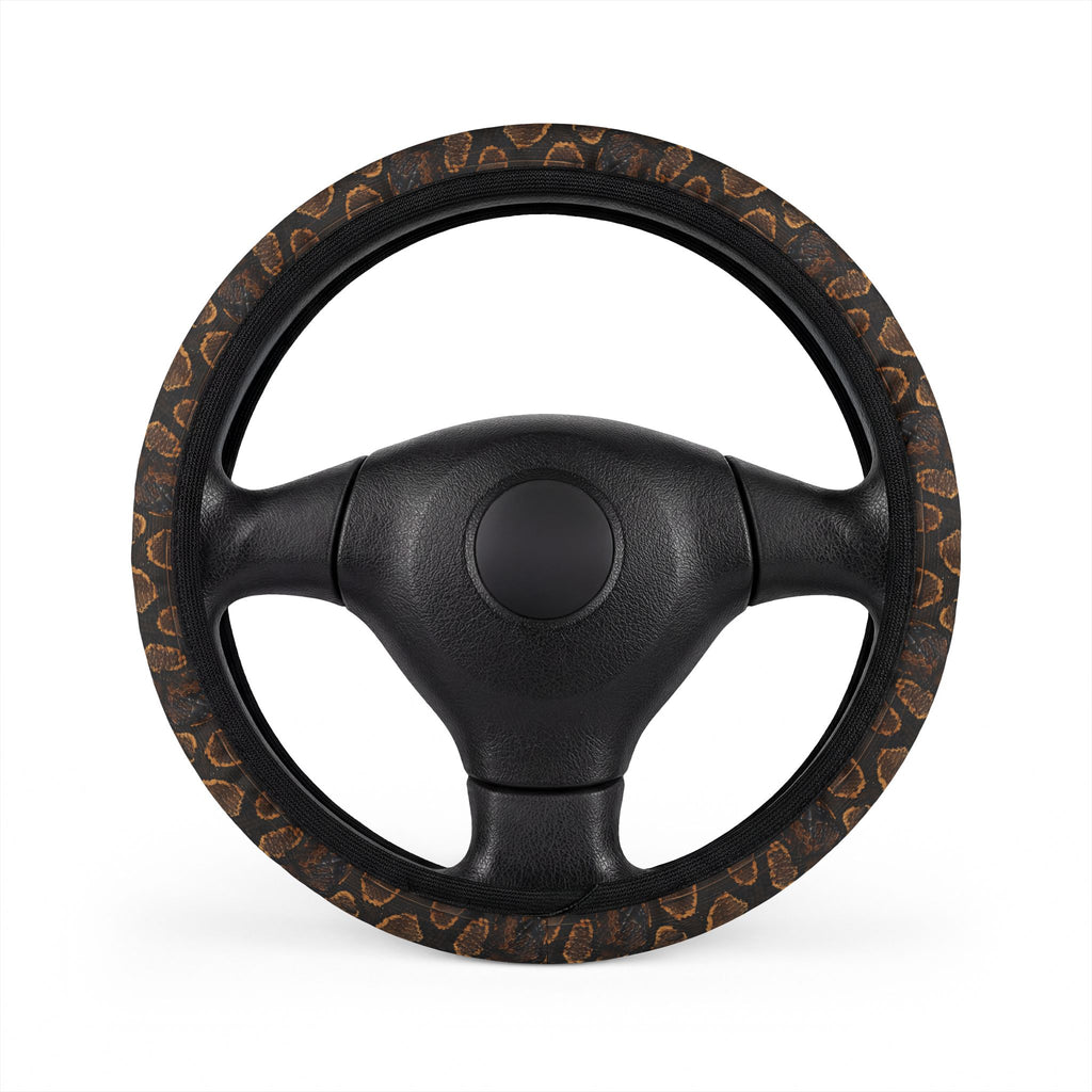 Black brown snake print steering wheel cover, on a steering wheel