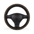 Black brown snake print steering wheel cover, on a steering wheel