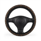 Black brown snake print steering wheel cover, on a steering wheel