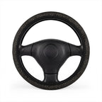 Black gold galaxy steering wheel cover, on a steering wheel
