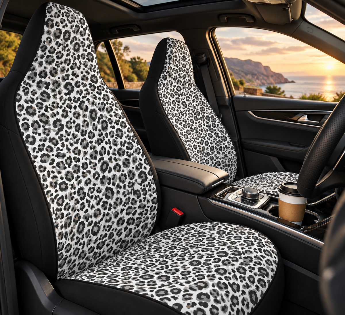 Black white cheetah print car seat covers shown in a car interior