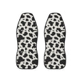 Black white cow print car seat covers, set of two shown side by side