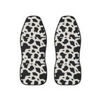 Black white cow print car seat covers, set of two shown side by side