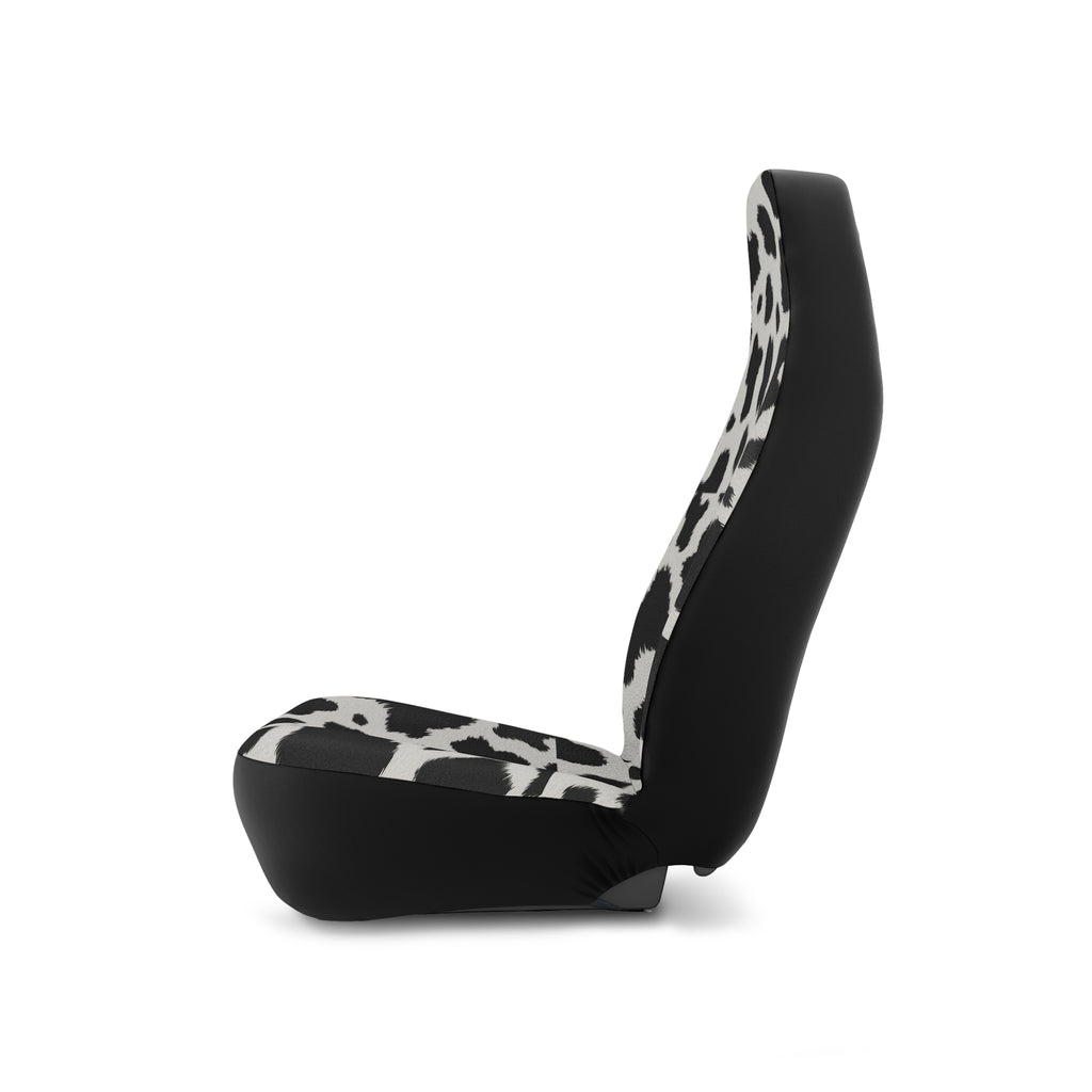 Black white cow print car seat covers, on a seat, side view facing left