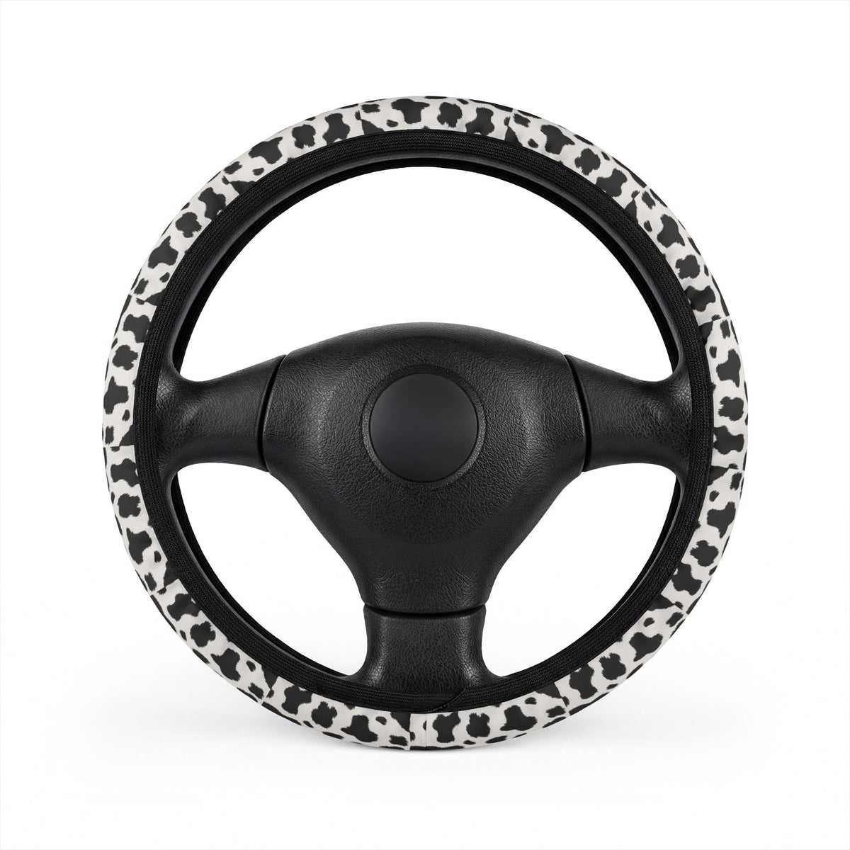 Black white cow print steering wheel cover, front view
