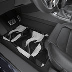 Black white wave car mats shown in a car interior