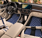 Blue star American flag car mats shown in a car interior