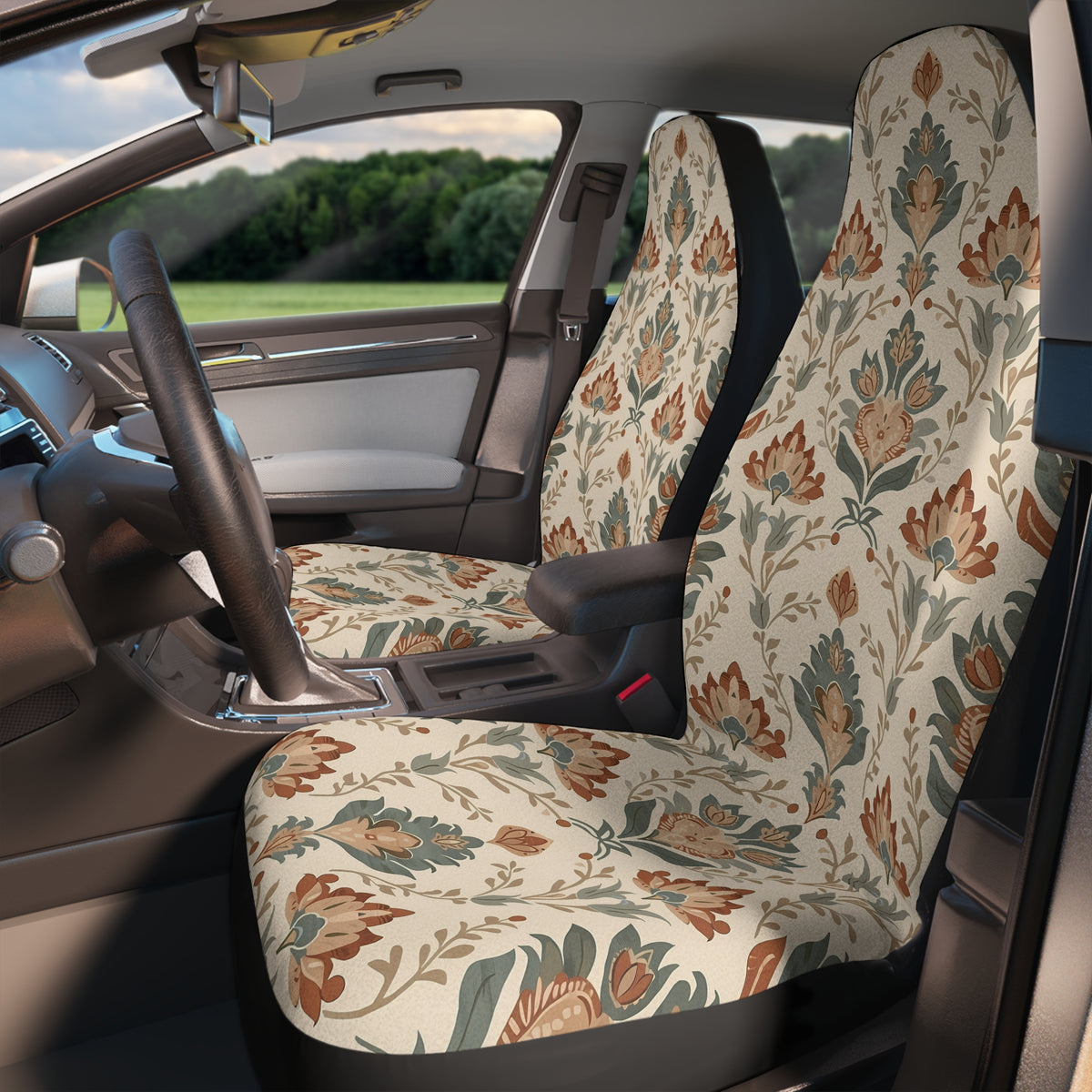 Boho forest print car seat covers, fitted on the front seats of a car