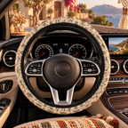 Boho forest print steering wheel cover shown in a car interior