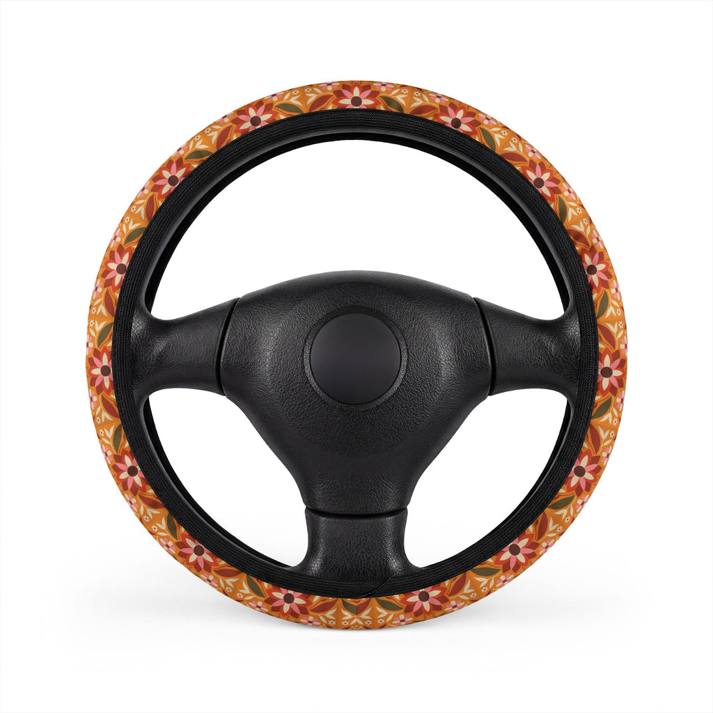 Boho orange floral steering wheel cover, on a steering wheel