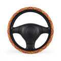 Boho orange floral steering wheel cover, on a steering wheel