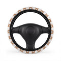 Boho rainbow arch steering wheel cover, on a steering wheel