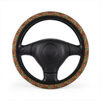 Brown floral steering wheel cover, on a steering wheel