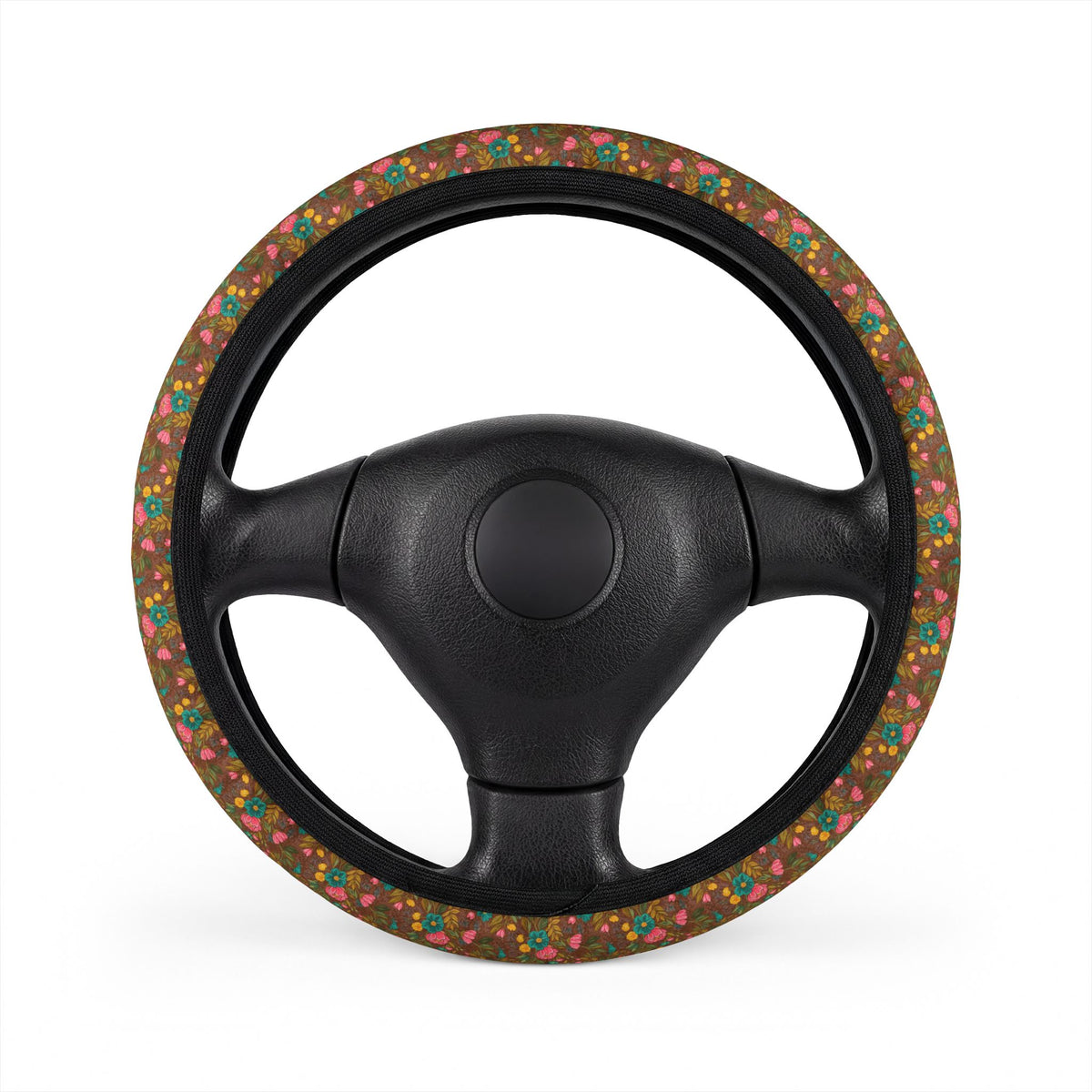 Brown floral steering wheel cover, on a steering wheel