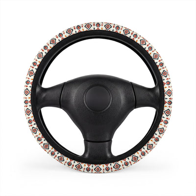 Cream boho tribal steering wheel cover, on a steering wheel