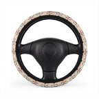 Cream pastel aztec steering wheel cover, on a steering wheel