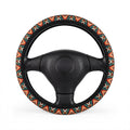 Dark aztec diamond steering wheel cover, on a steering wheel