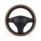Dark aztec diamond steering wheel cover, on a steering wheel