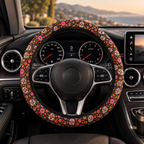 Floral gothic skull steering wheel cover shown in a car interior