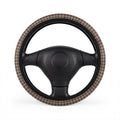 Gray houndstooth plaid steering wheel cover, on a steering wheel