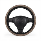 Gray houndstooth plaid steering wheel cover, on a steering wheel