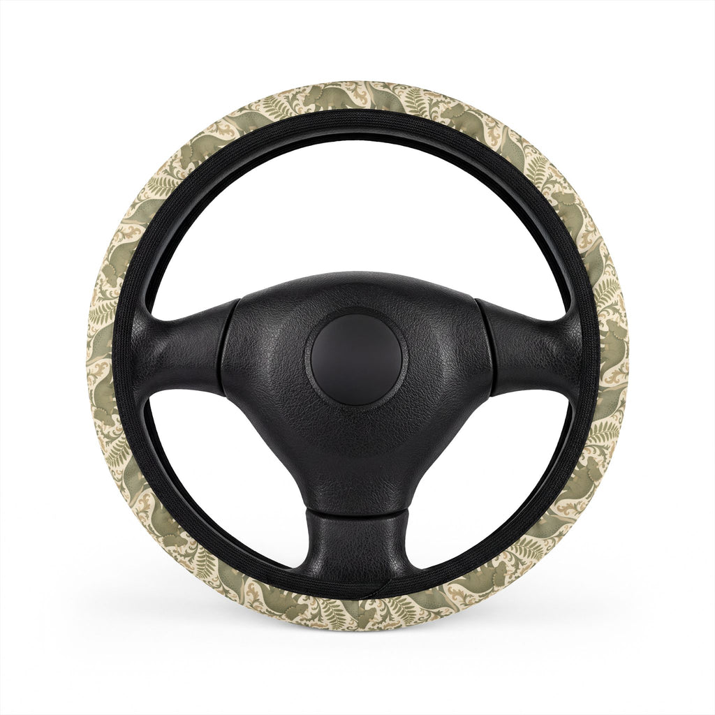 Green dinosaur steering wheel cover, on a steering wheel