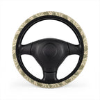 Green dinosaur steering wheel cover, on a steering wheel