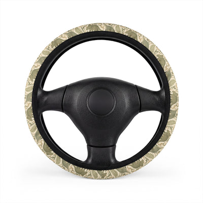 Green dinosaur steering wheel cover, on a steering wheel