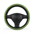 Green polka dot steering wheel cover, on a steering wheel