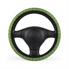Green polka dot steering wheel cover, on a steering wheel