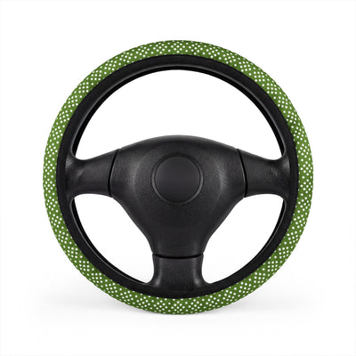 Green polka dot steering wheel cover, on a steering wheel