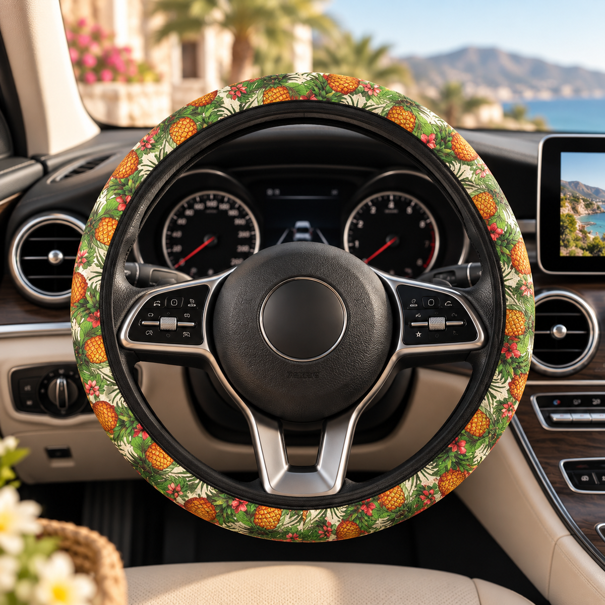 Hawaiian pineapple print steering wheel cover shown in a car interior
