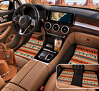 Orange aztec stripe car mats shown in a car interior