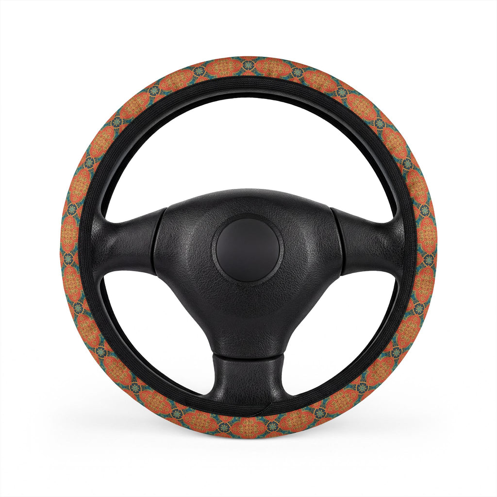 Orange floral steering wheel cover, on a steering wheel