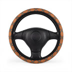 Orange floral steering wheel cover, on a steering wheel
