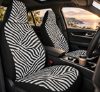 Patchwork zebra print car seat covers shown in a car interior